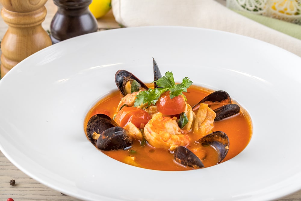 garlic butter shrimp and mussels in a serving bowl