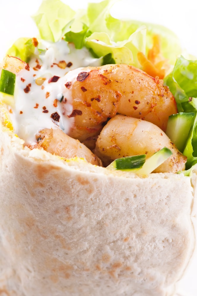 shrimp wrap in tortilla wrap with lettuce