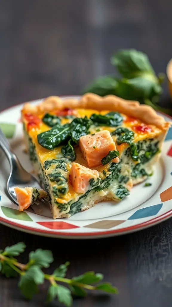 A slice of salmon quiche with spinach on a colorful plate, garnished with fresh herbs.